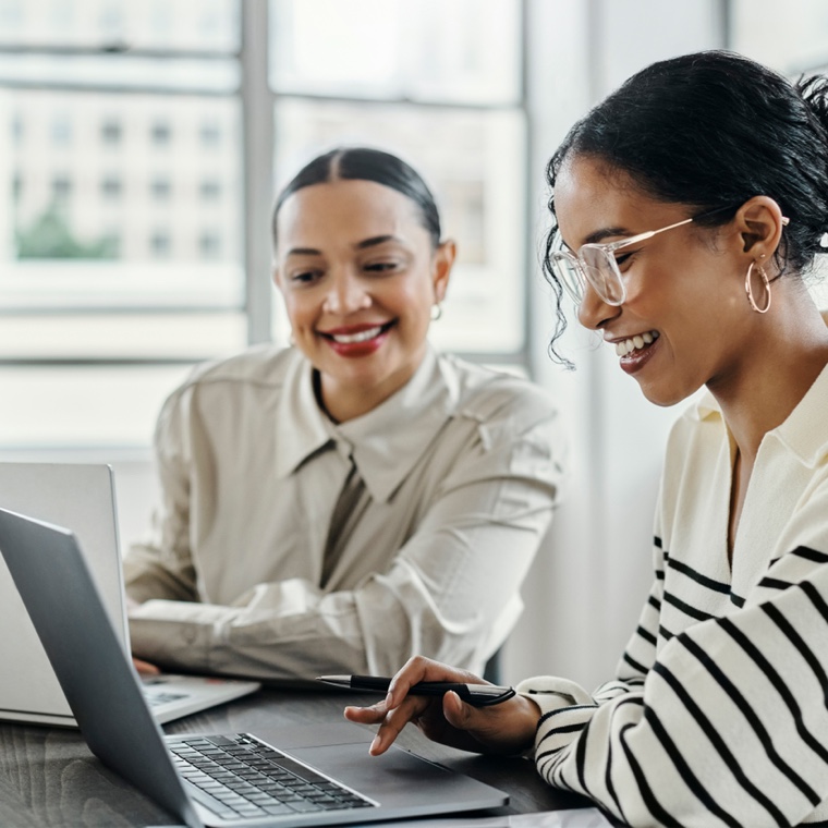Ladies looking at a laptop