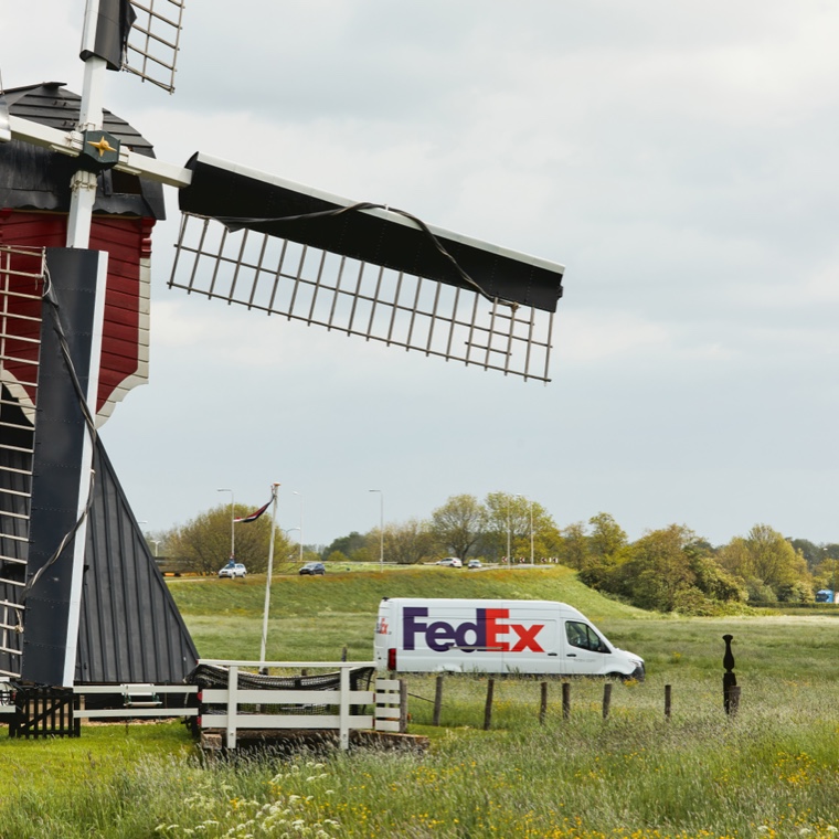 truck next to windmill