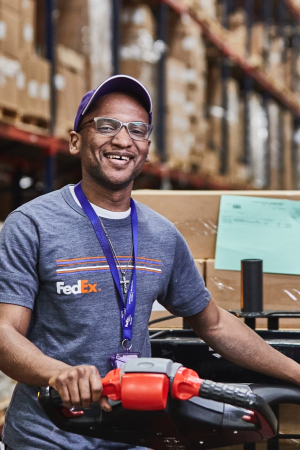 FedEx Employee working at a warehouse